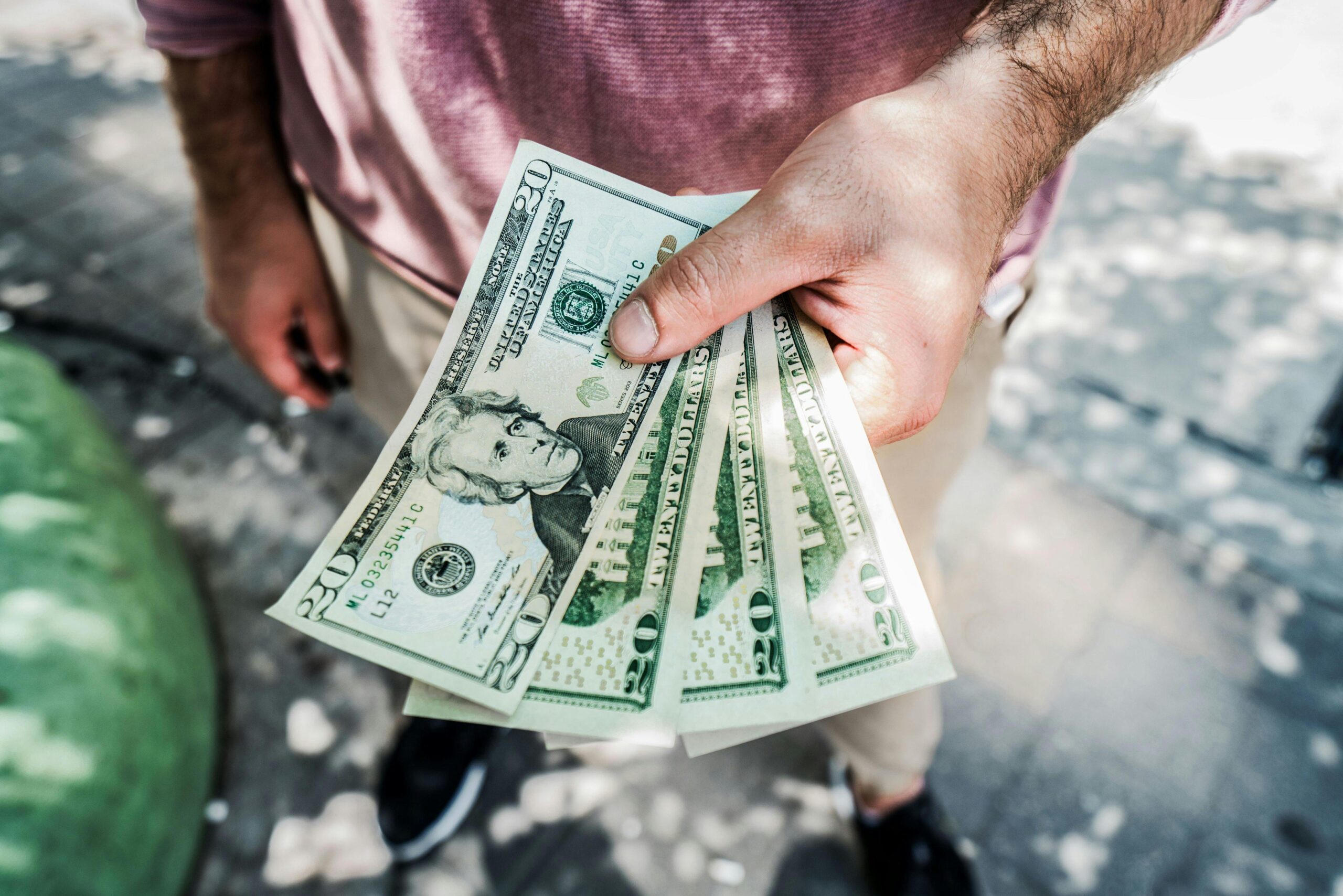 Person holding money